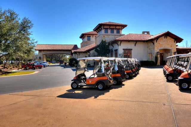 a view of a swimming pool with a yard