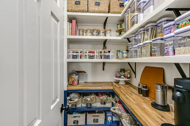 a storage room with washer and dryer