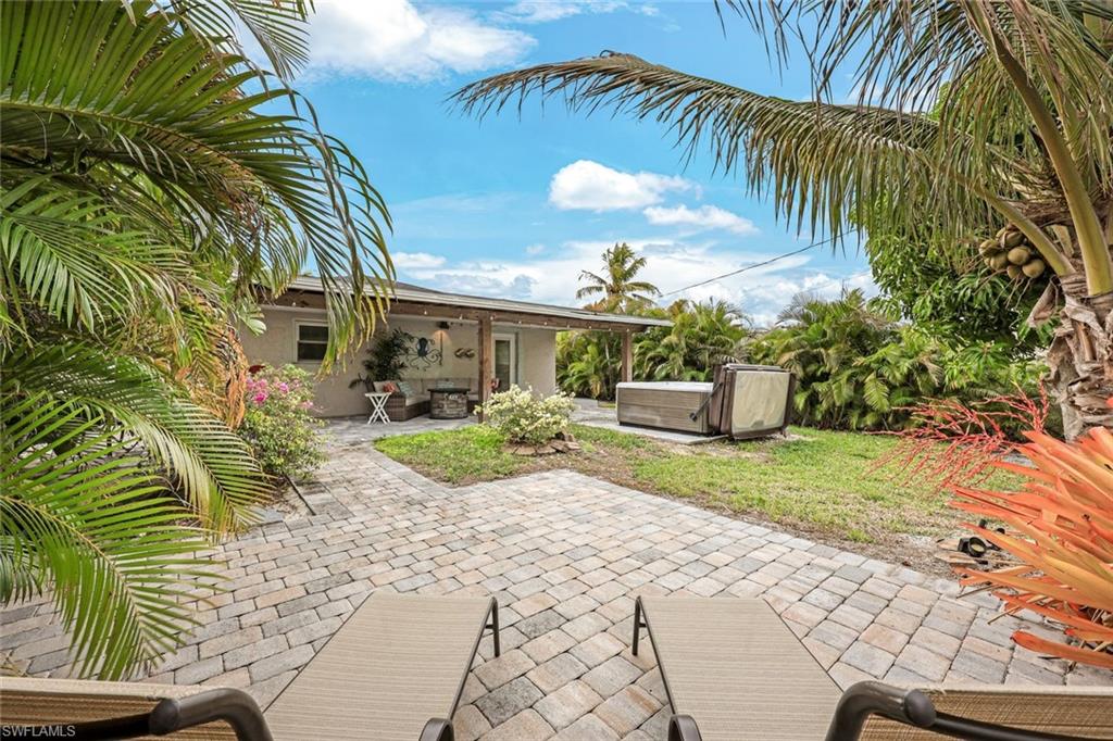 645 101st Avenue North Naples, FL 34108 - Photo 16 of 24 a view of a back yard of the house
