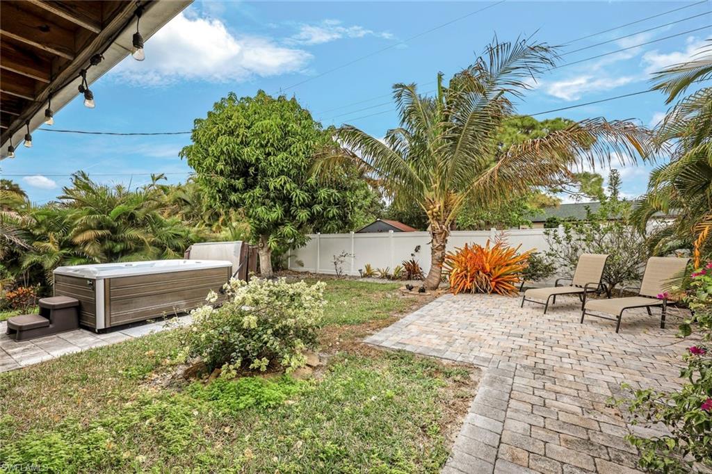 645 101st Avenue North Naples, FL 34108 - Photo 17 of 24 a view of a backyard with sitting area