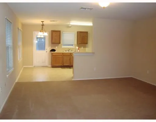 a view of a kitchen with a sink