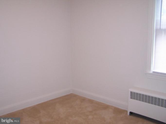 8027 Ridgely Oak Road Parkville, MD 21234 - Photo 22 of 24 a view of an empty room and a window