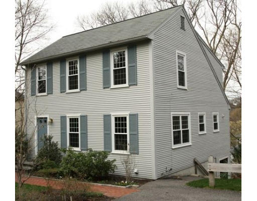 18 Pine Ridge Road Wellesley, MA 02481 - Photo 1 of 1 a front view of a house with yard