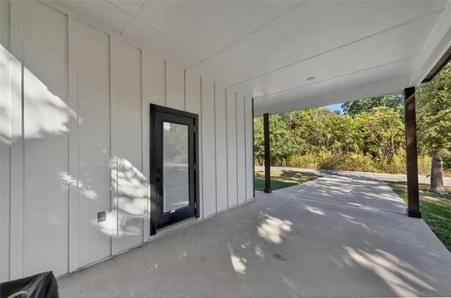 a view of a big room with an outdoor space and balcony