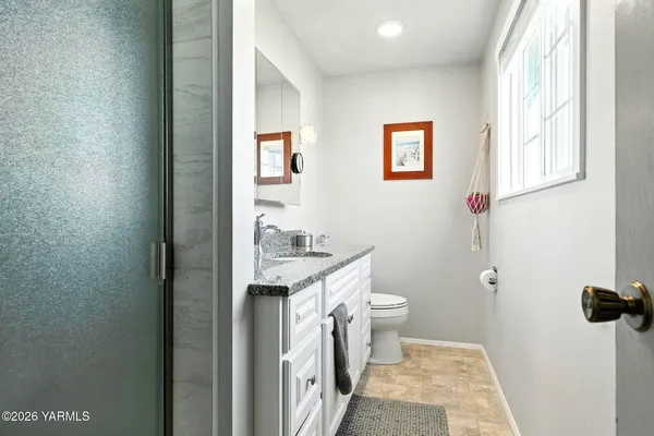 a bathroom with a sink and a toilet