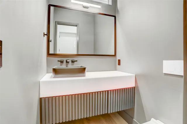a view of kitchen with granite countertop cabinets and a sink