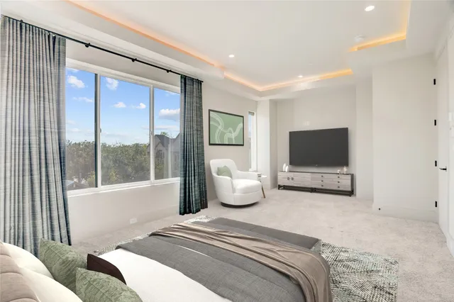 a white bath tub sitting next to a white sink