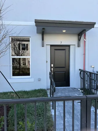 a view of a house with a small porch