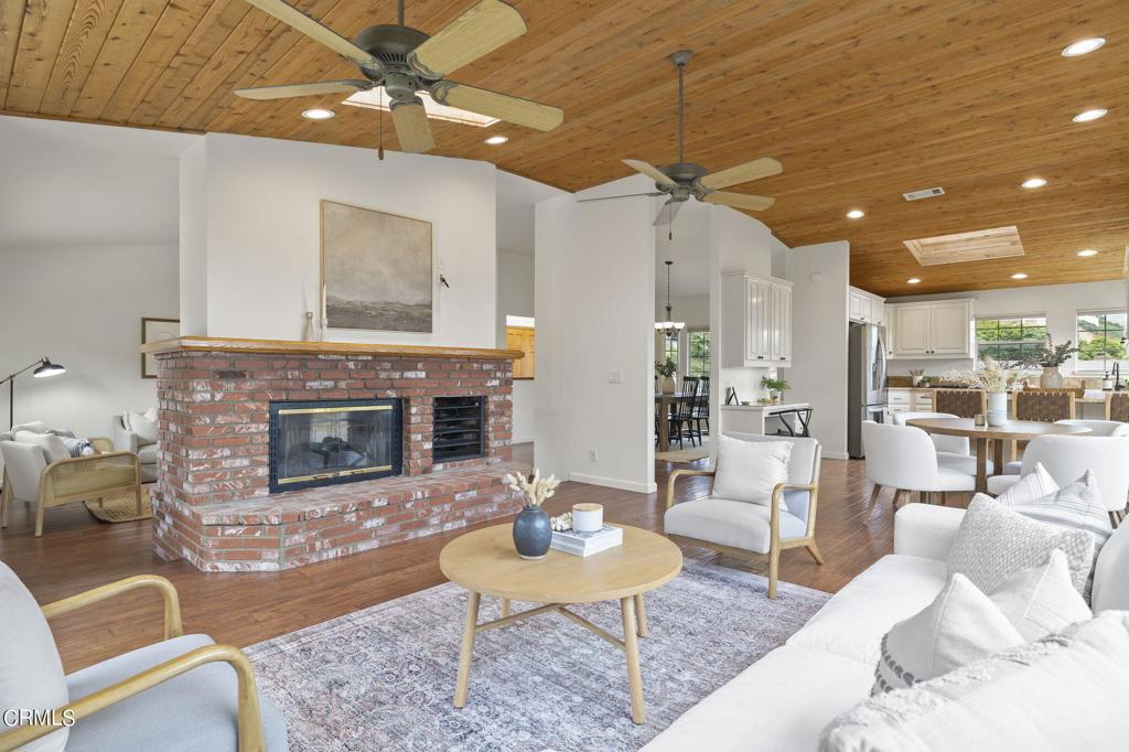 116 Via Pasito Ventura, CA 93003 - Photo 18 of 61 a living room with furniture and a fireplace