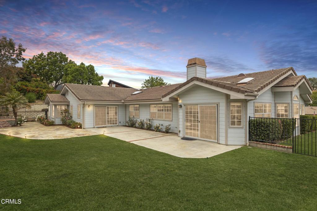 116 Via Pasito Ventura, CA 93003 - Photo 2 of 61 a front view of a house with a garden and yard