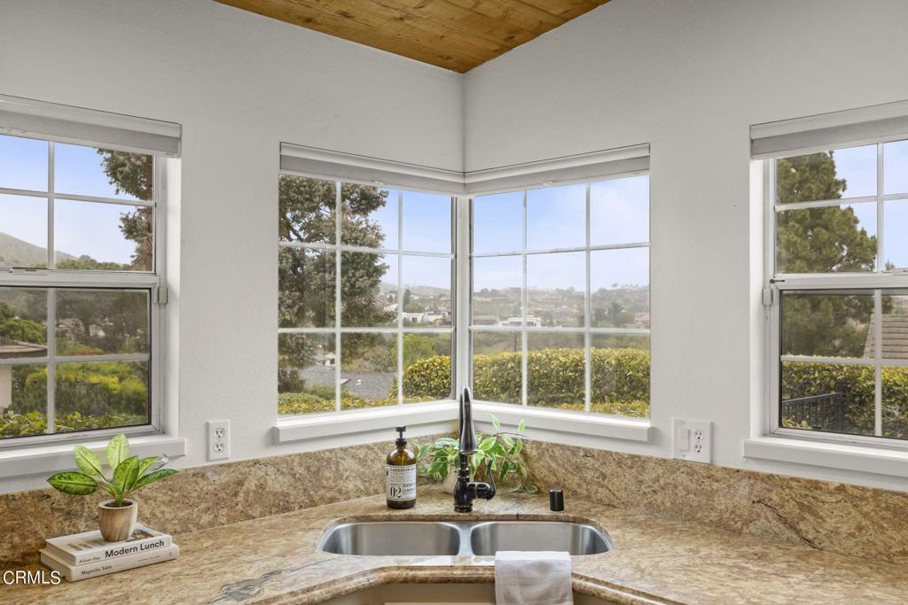 116 Via Pasito Ventura, CA 93003 - Photo 23 of 61 a bathroom with a granite countertop window and a sink