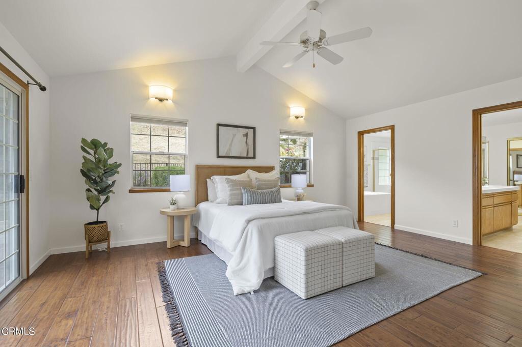 116 Via Pasito Ventura, CA 93003 - Photo 26 of 61 a spacious bedroom with a large bed and a potted plant