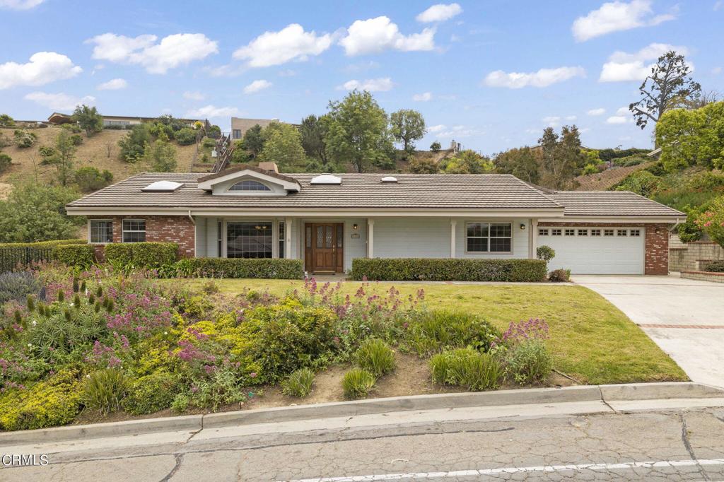 116 Via Pasito Ventura, CA 93003 - Photo 3 of 61 front view of a house with a yard