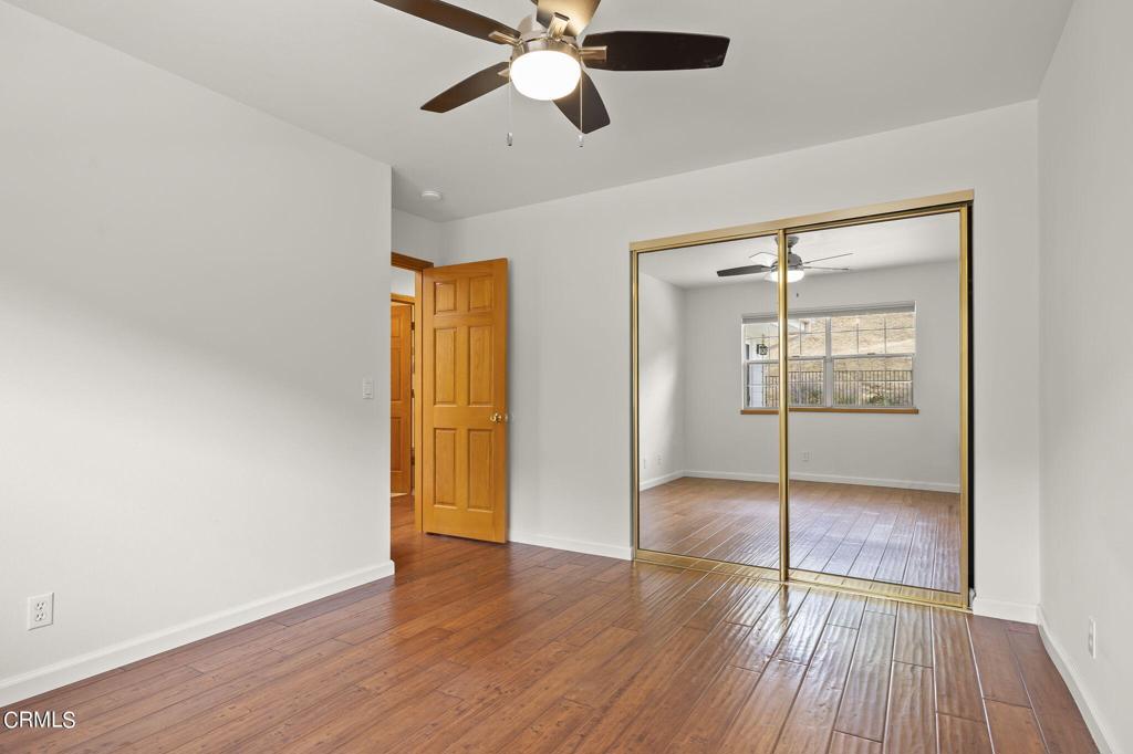 116 Via Pasito Ventura, CA 93003 - Photo 40 of 61 wooden floor in an empty room with a window