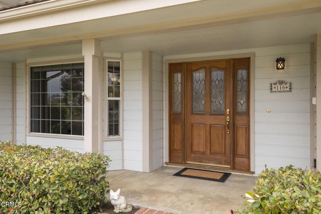 116 Via Pasito Ventura, CA 93003 - Photo 5 of 61 a front view of a house with a garden