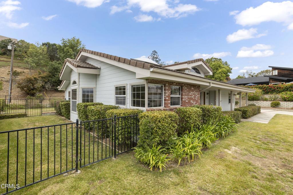 116 Via Pasito Ventura, CA 93003 - Photo 55 of 61 a front view of a house with a garden