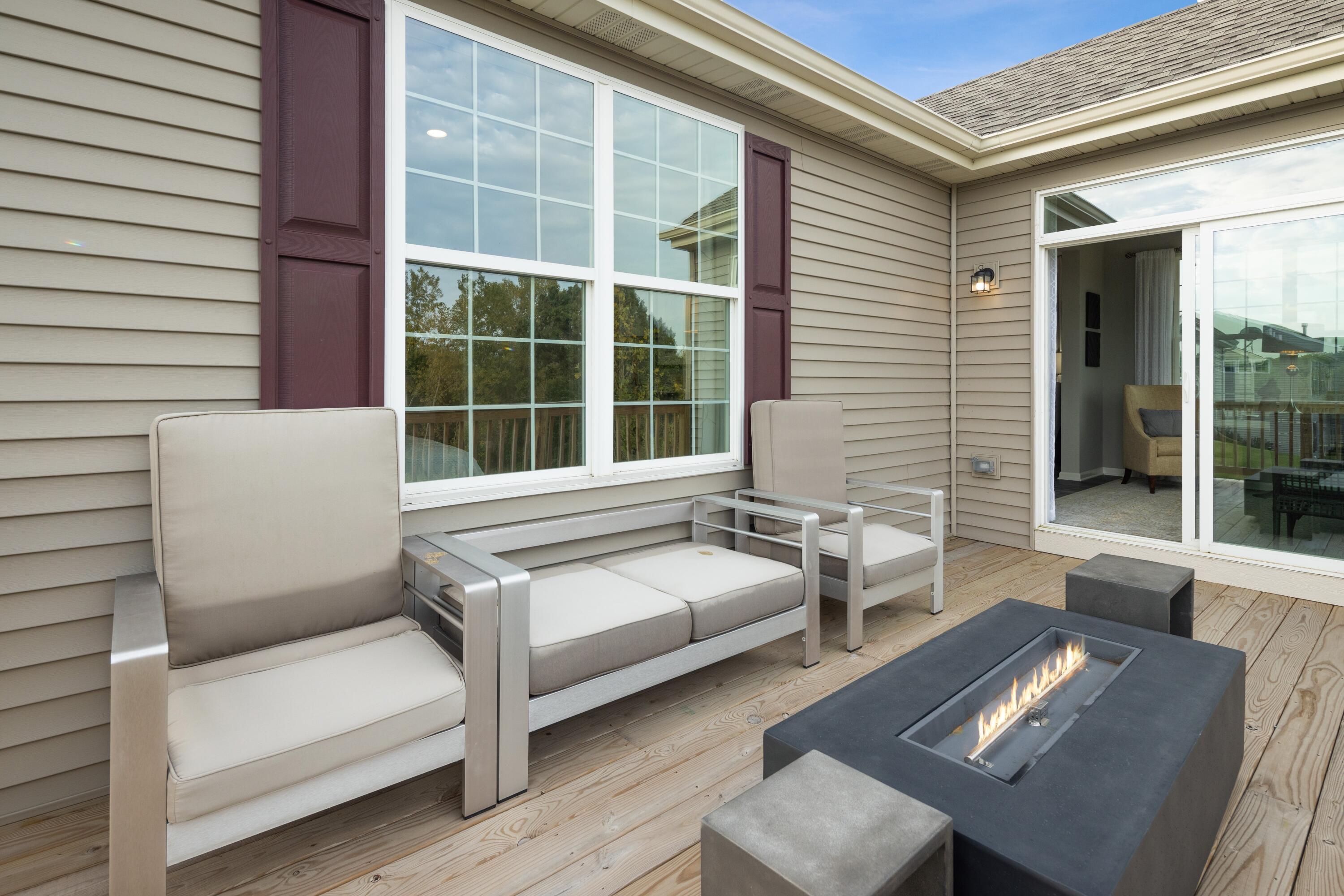 8468 Graystone Drive Lowell, IN 46356 - Photo 14 of 14 a balcony with furniture and a window