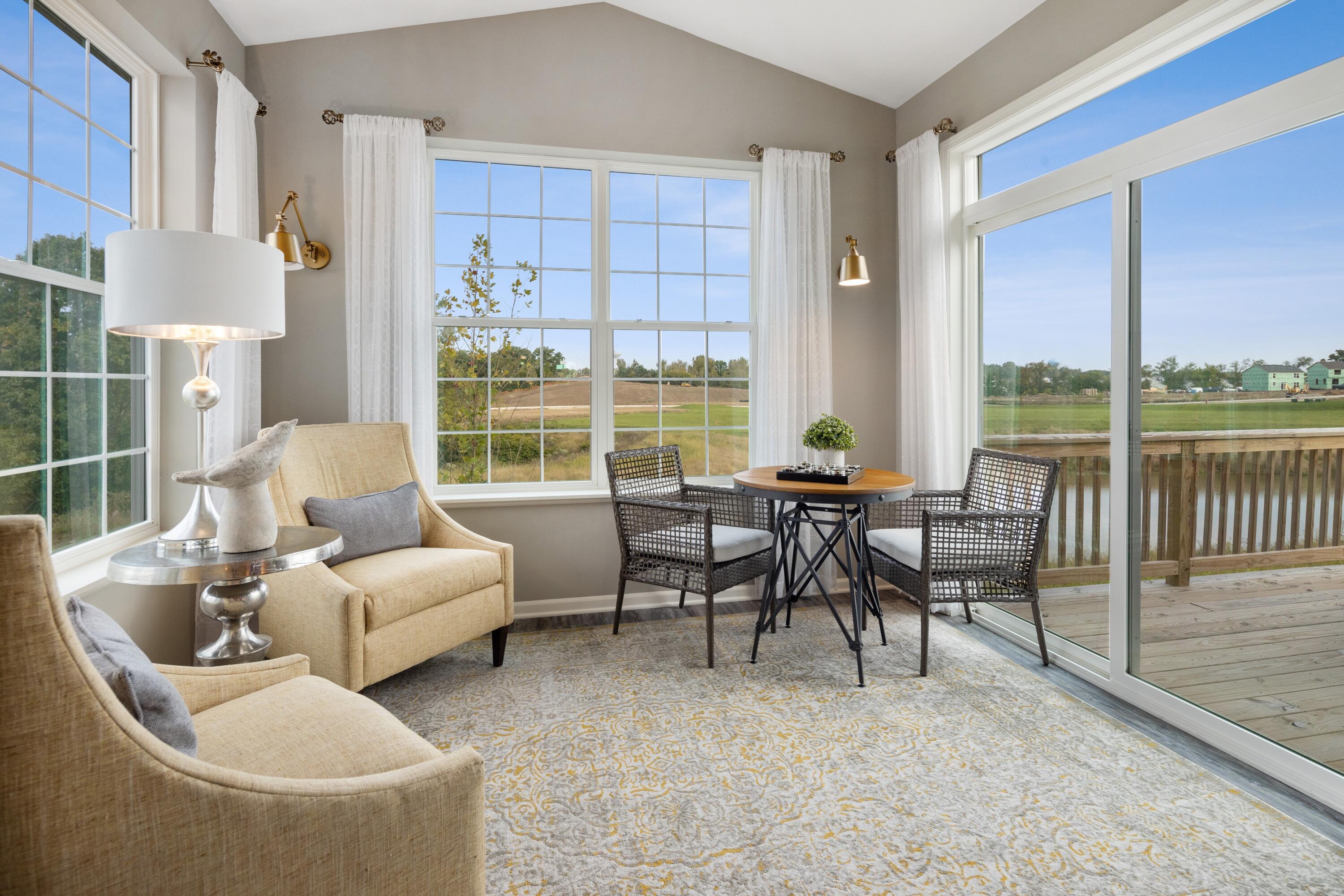 8468 Graystone Drive Lowell, IN 46356 - Photo 4 of 14 a living room with furniture and a floor to ceiling window