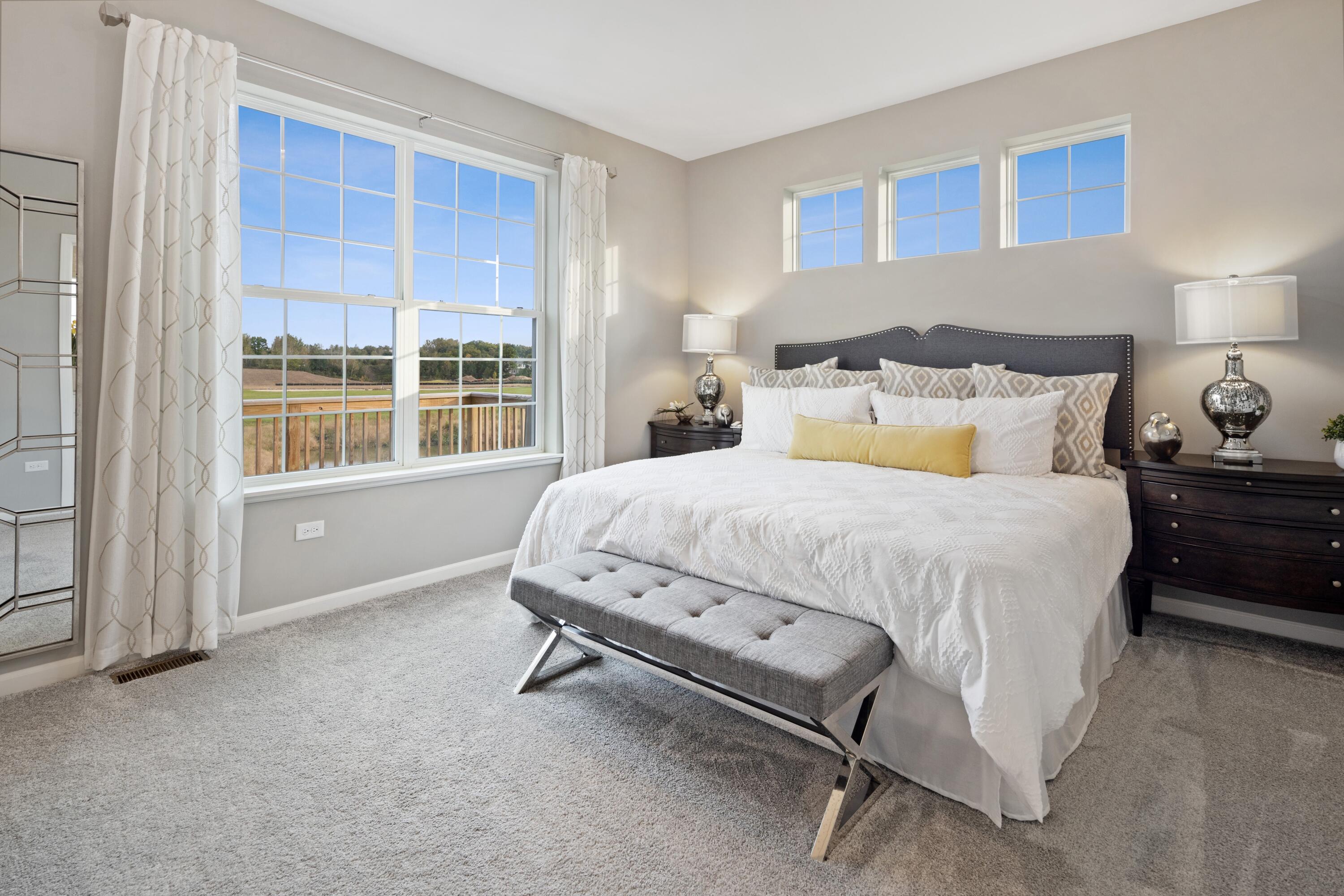8468 Graystone Drive Lowell, IN 46356 - Photo 10 of 14 a bedroom with a bed chair and window