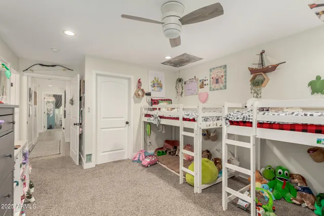 a bed room with a bed and a window