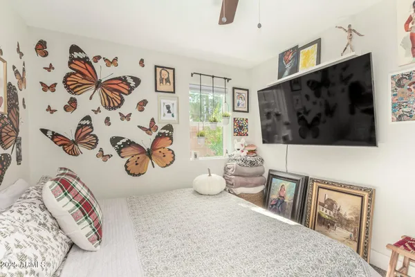 a living room with a couch and a flat screen tv
