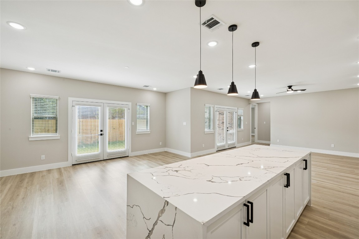 2614 Liguria Lane Spring, TX 77388 - Photo 4 of 23 Spacious and inviting family room with ample natural light and seamless indoor-outdoor flow.