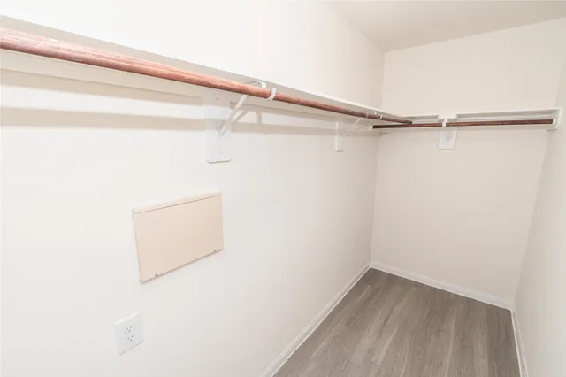 a view of a room with racks on the wall