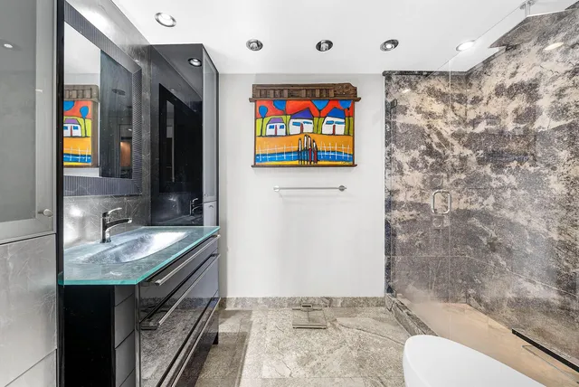 a view of kitchen with furniture and a potted plant