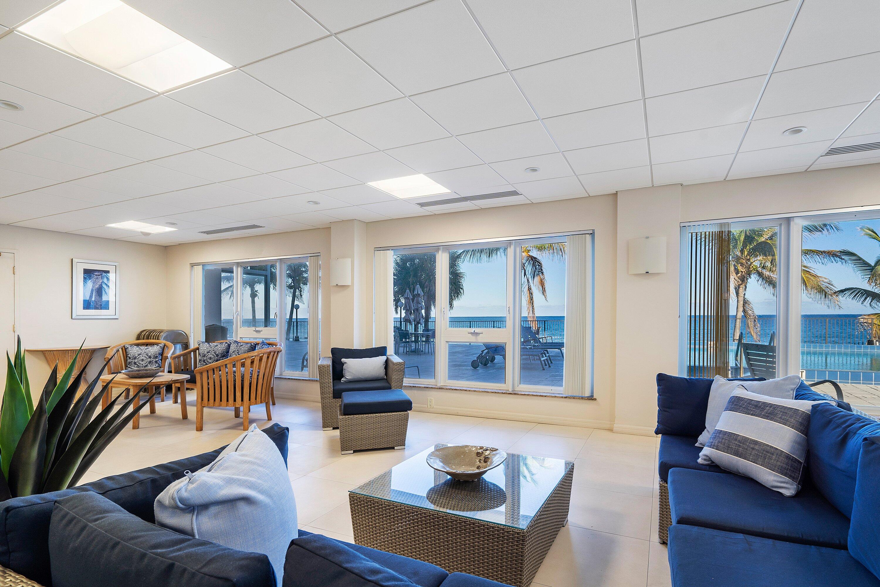 2066 North Ocean Boulevard, Unit 9NE Boca Raton, FL 33431 - Photo 41 of 45 a living room with furniture and wooden floor