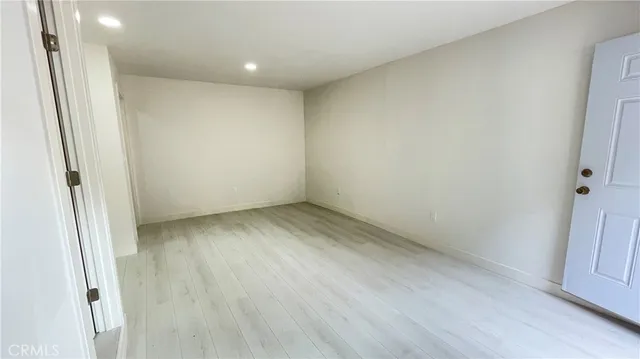 a view of a street sign under a street sign