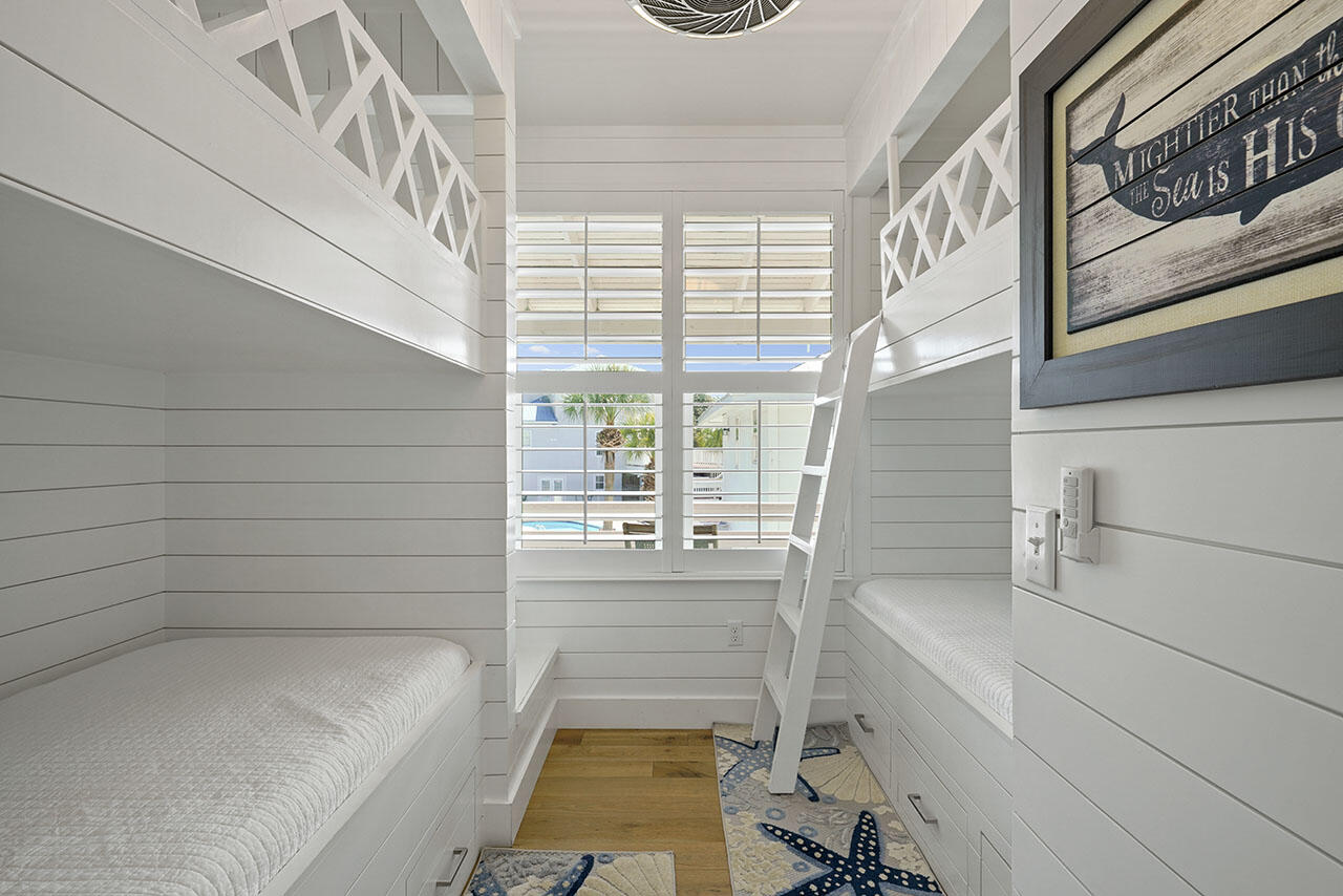 54 Dune Drive Santa Rosa Beach, FL 32459 - Photo 11 of 42 a bathroom with a tub a sink and a large window