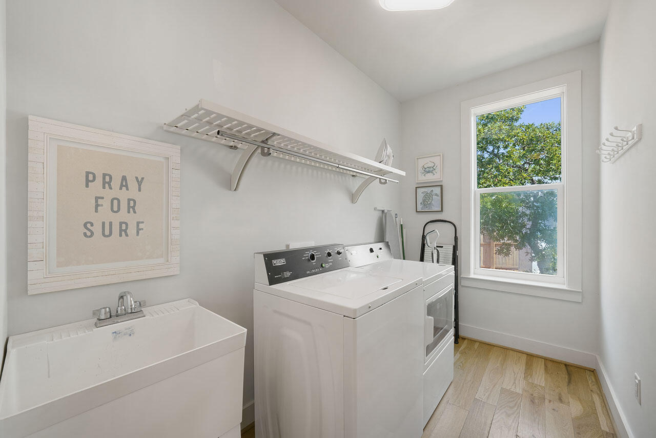 54 Dune Drive Santa Rosa Beach, FL 32459 - Photo 18 of 42 a utility room with dryer and washer