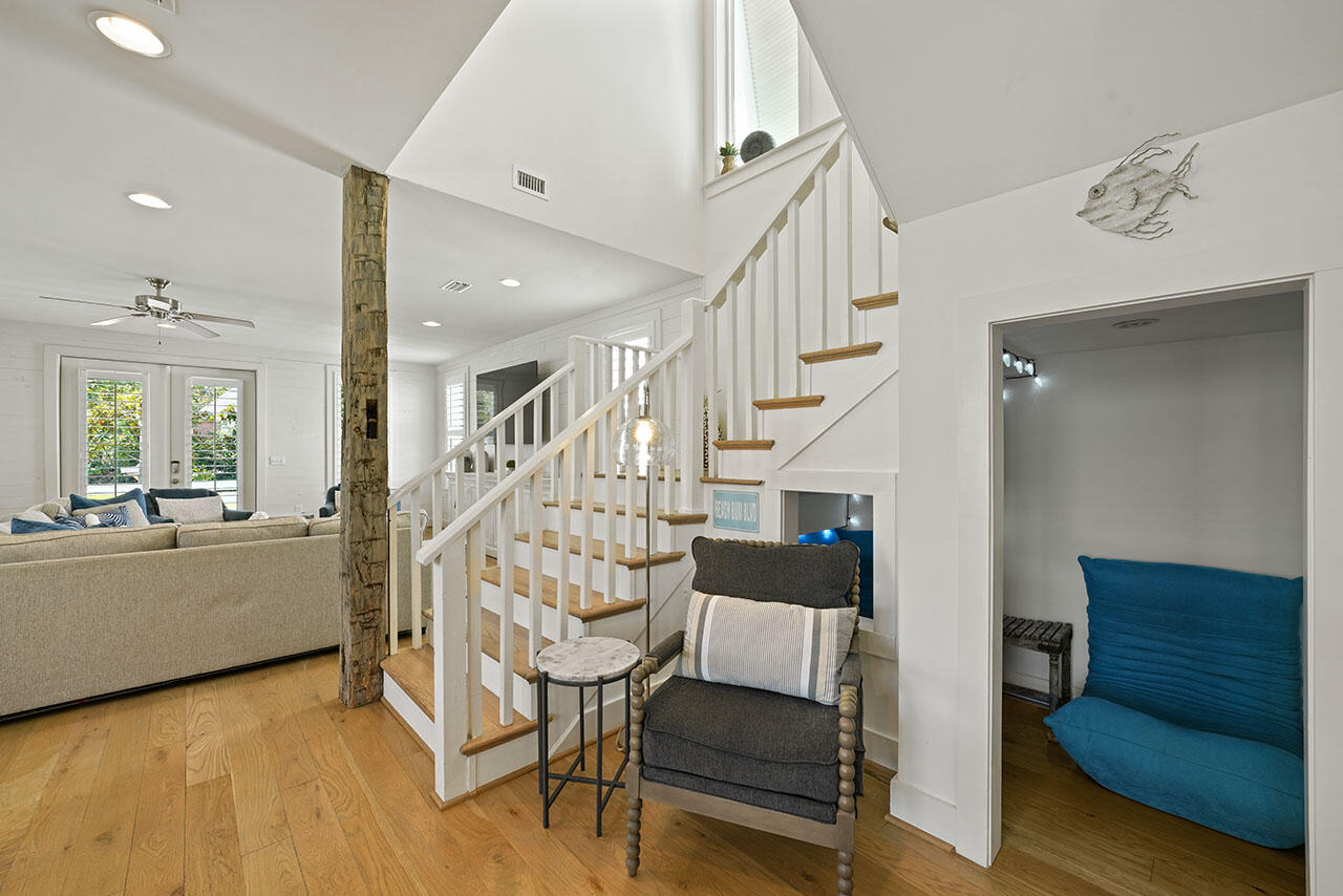 54 Dune Drive Santa Rosa Beach, FL 32459 - Photo 19 of 42 a view of entryway and hall with wooden floor