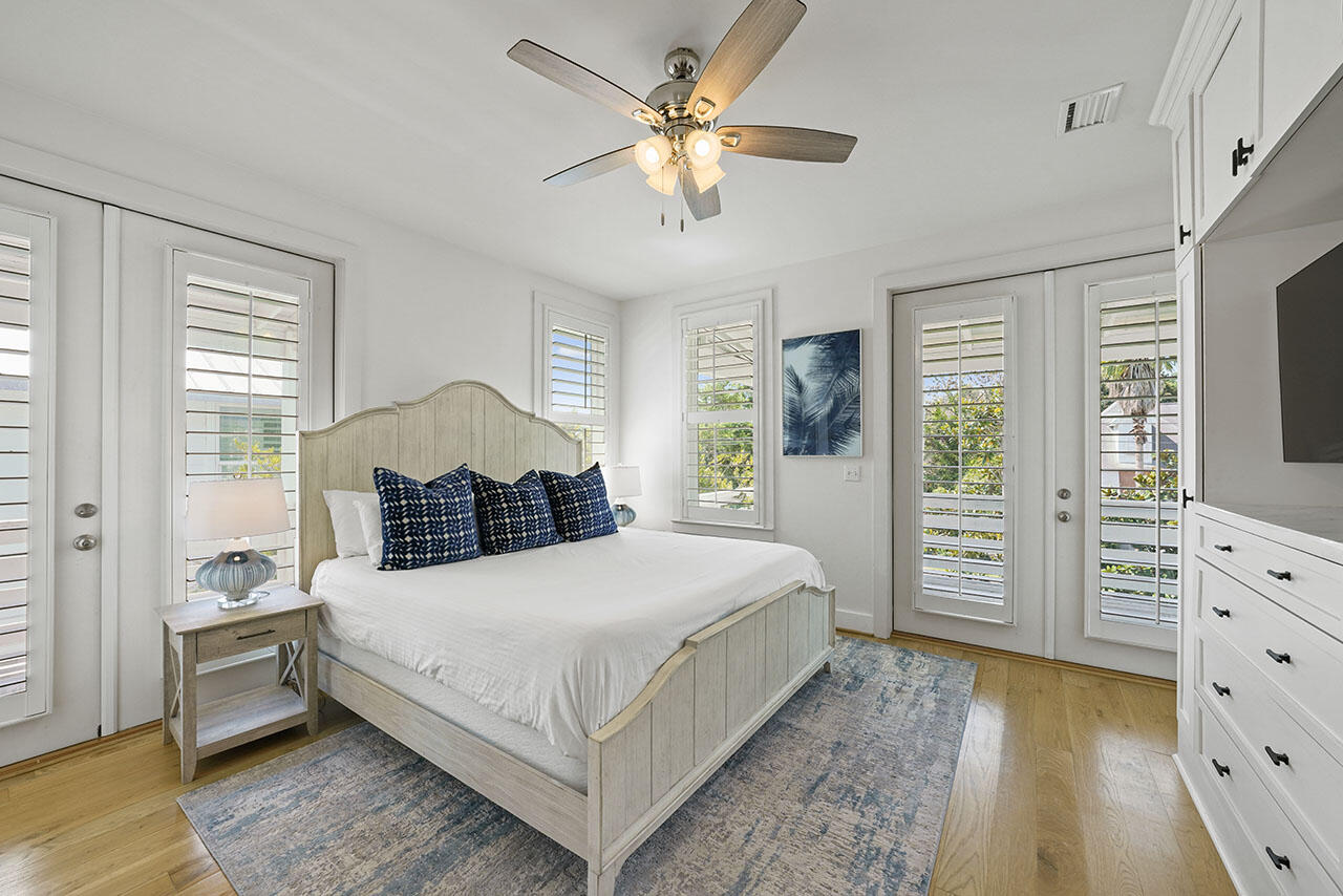 54 Dune Drive Santa Rosa Beach, FL 32459 - Photo 23 of 42 a bedroom with a bed and a dresser