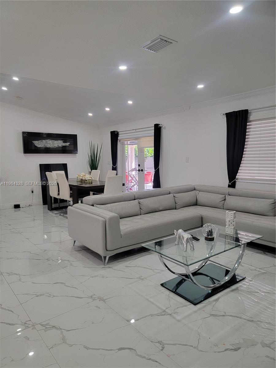 25209 Southwest 134th Avenue Homestead, FL 33032 - Photo 11 of 33 a living room with furniture and a couch