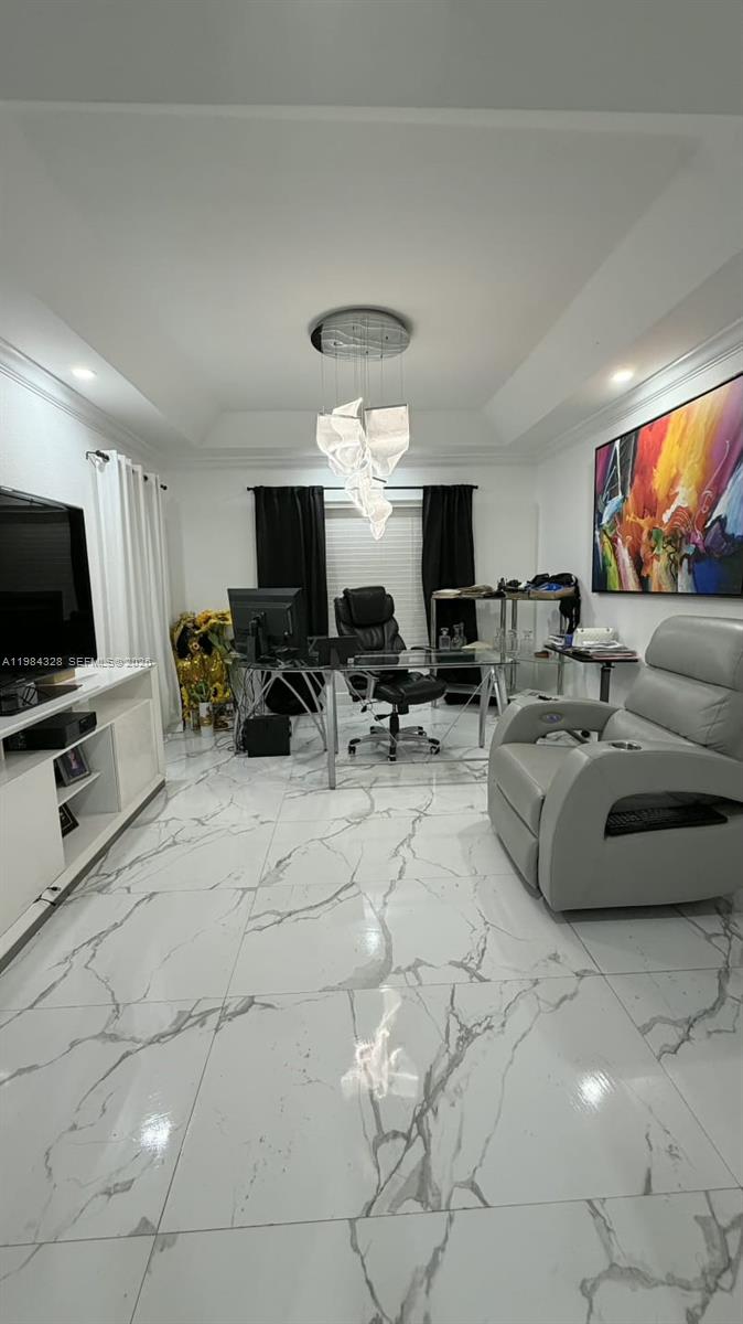 25209 Southwest 134th Avenue Homestead, FL 33032 - Photo 16 of 33 a living room with furniture and a flat screen tv