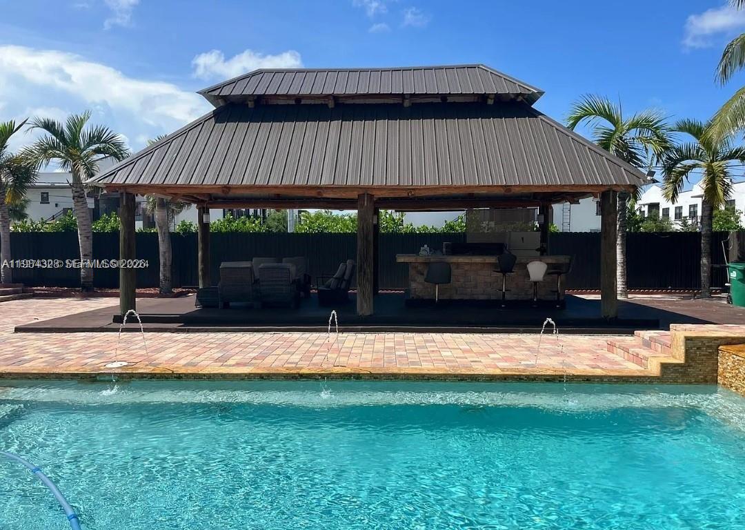 25209 Southwest 134th Avenue Homestead, FL 33032 - Photo 33 of 33 a view of a house with backyard and sitting area