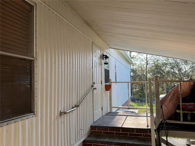 a view of backyard from balcony