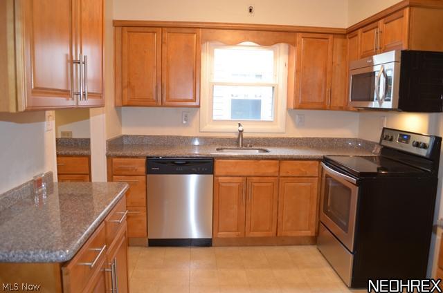 3282 Chalfant Road Cleveland, OH 44120 - Photo 6 of 19 Recently updated eat in kitchen with granite counters and stainless appliances.