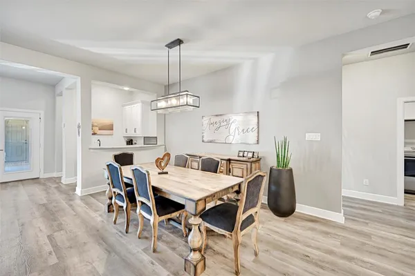 a kitchen with sink and cabinets