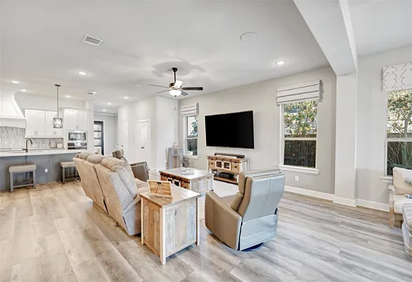 a view of a kitchen and dining room