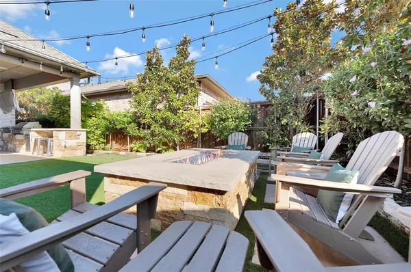 a garden view with a seating space