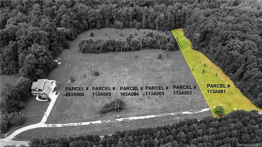 956 Barnhardt Road, Unit 1 China Grove, NC 28023 - Photo 1 of 7 a view of a swimming pool with a bench in the background