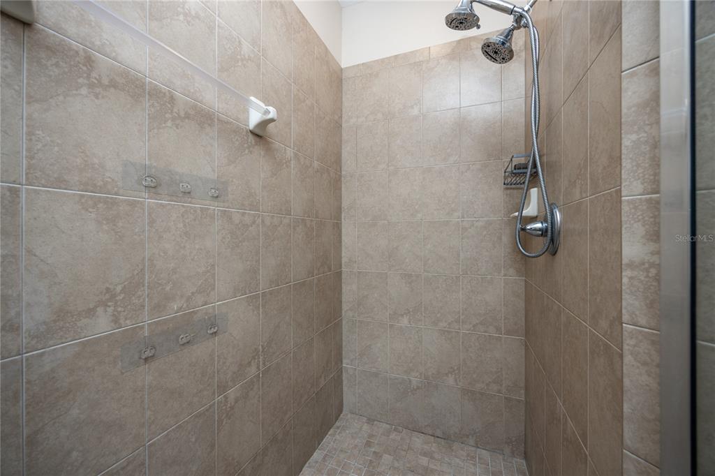 8216 Northwest 54th Street Gainesville, FL 32653 - Photo 41 of 58 a bathroom with a shower