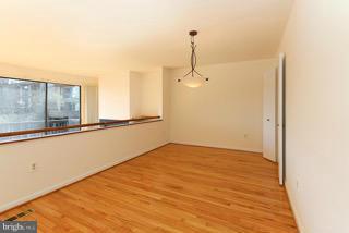 2022 Lakebreeze Way Reston, VA 20191 - Photo 13 of 25 a view of a room with wooden floor