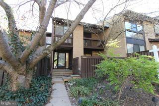 2022 Lakebreeze Way Reston, VA 20191 - Photo 5 of 25 a view of a pathway of a house with a tree