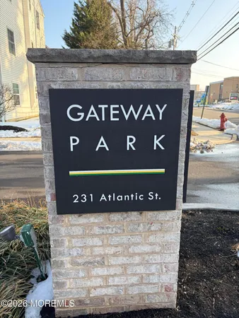 a kitchen with stainless steel appliances granite countertop a stove a refrigerator and a microwave