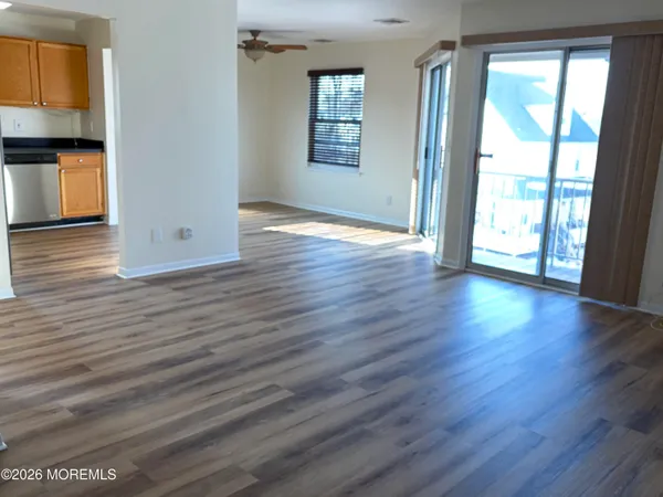 a view of wooden floor in an empty room