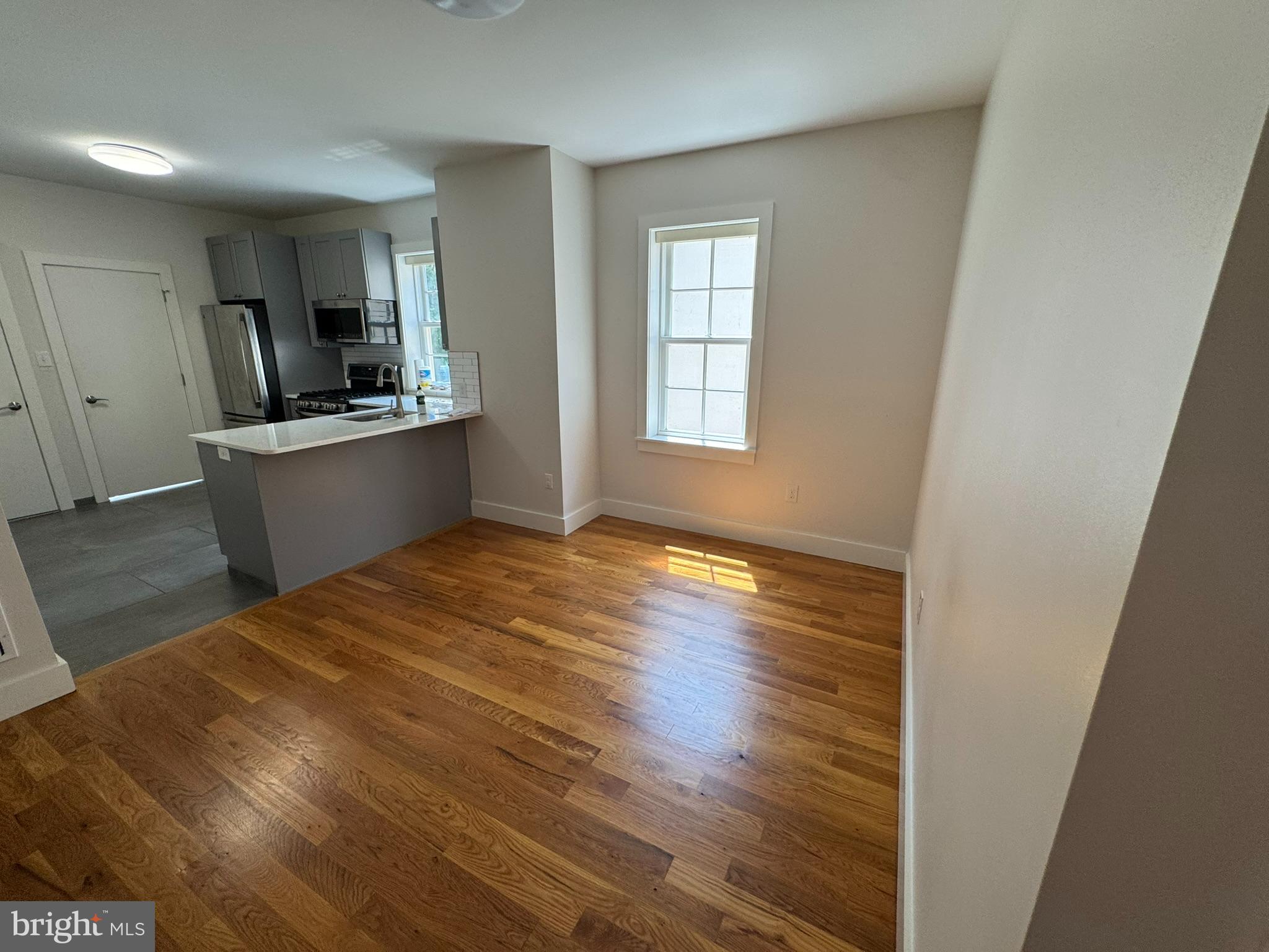 205 Witherspoon Street, Unit 2 Princeton, NJ 08542 - Photo 4 of 12 a view of a kitchen from the hallway