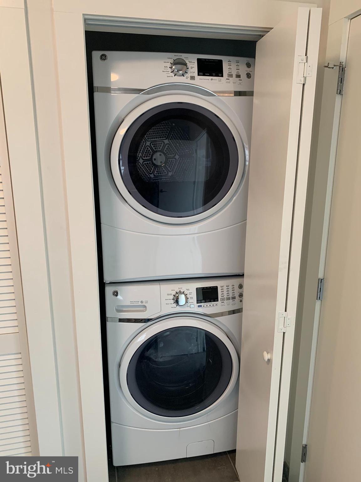 205 Witherspoon Street, Unit 2 Princeton, NJ 08542 - Photo 6 of 12 a utility room with dryer and washer